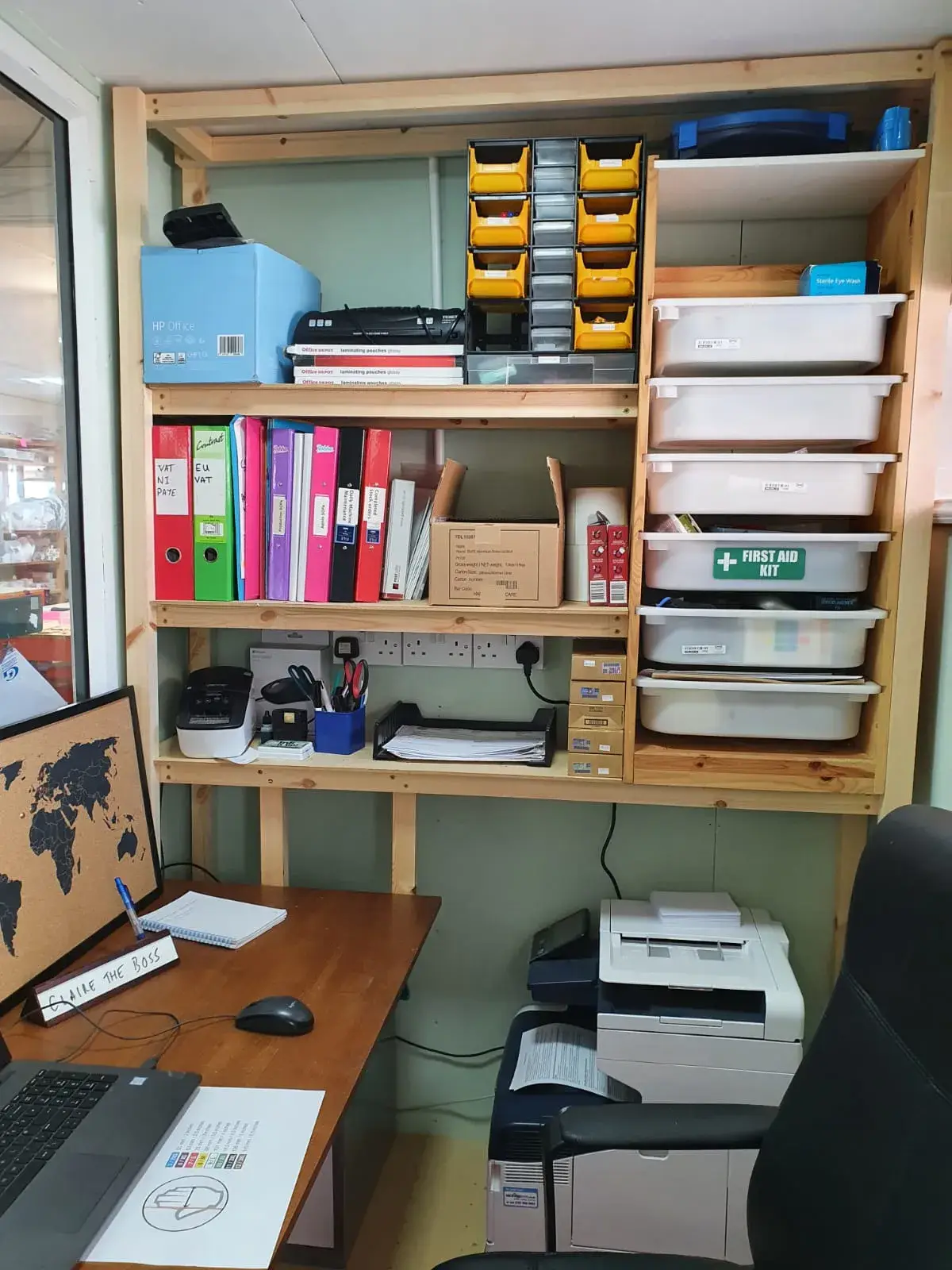 Freestanding shelving unit built for home office storage